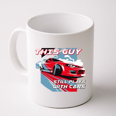 This Guy Still Plays With Cars Coffee Mug