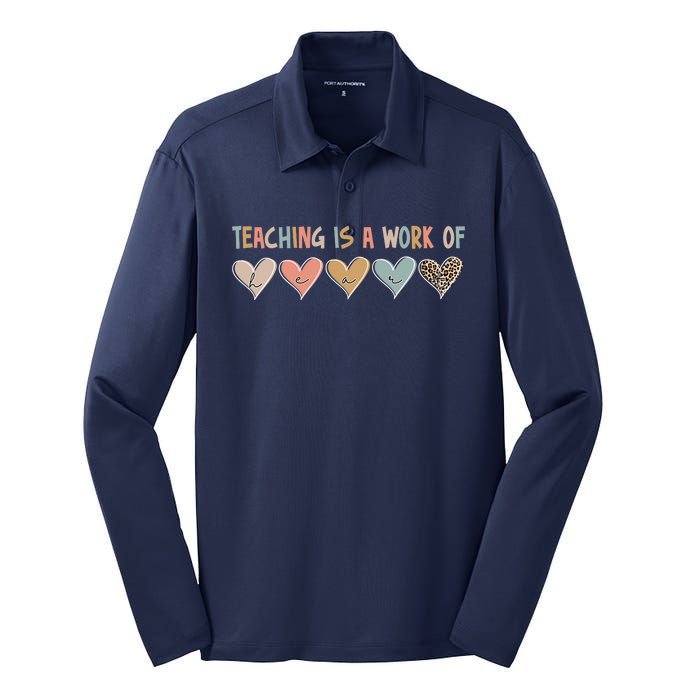 Teaching Is A Work Of Hearts Silk Touch Performance Long Sleeve Polo