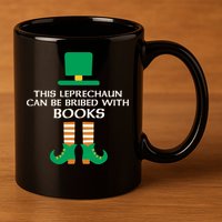 This Leprechaun Can Be Bribed With Books Read St Paddy Day Gift 11oz C Handle Ceramic Mug