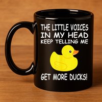 The Little Voices In My Head Keep Telling Me Get More Ducks 11oz C Handle Ceramic Mug