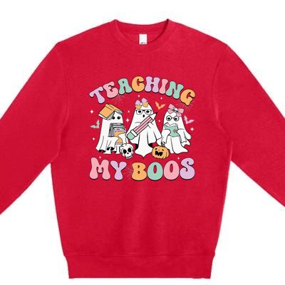 Teaching My Boos Cute Book Ghost Groovy Teacher Halloween Premium Crewneck Sweatshirt