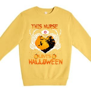 This Nurse Loves Halloween Skeleton Hand Heart Gift Premium Crewneck Sweatshirt