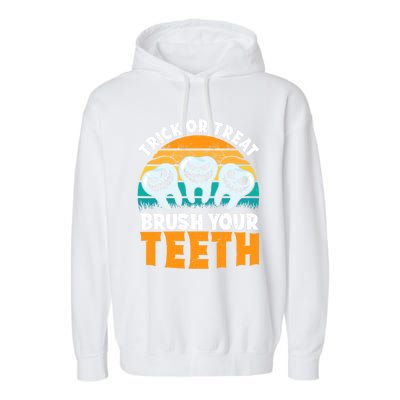 Trick Or Treat Brush Your Teeth Dentist Pun Halloween Dental Funny Gift Garment-Dyed Fleece Hoodie