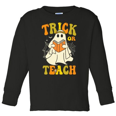 Trick Or Teach Groovy Halloween Retro Floral Ghost Teacher Toddler Long Sleeve Shirt