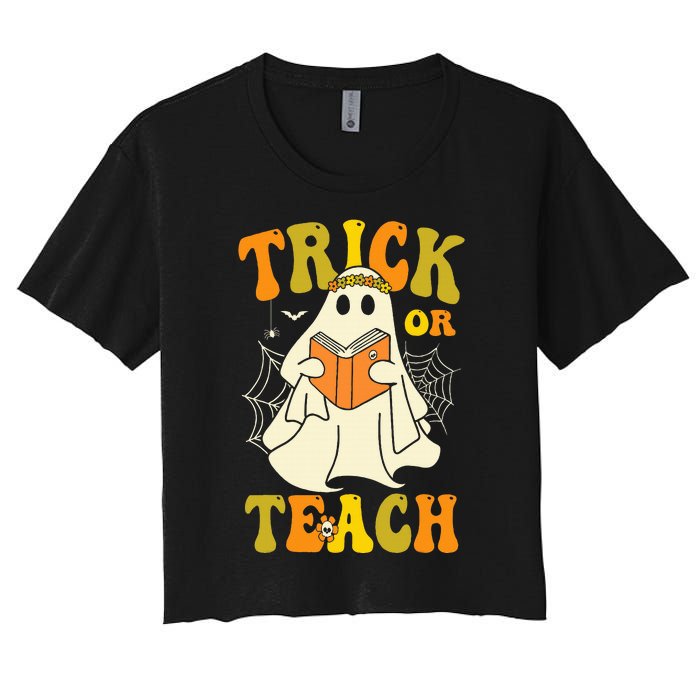 Trick Or Teach Groovy Halloween Retro Floral Ghost Teacher Women's Crop Top Tee