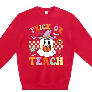 Trick Or Teach Groovy Teacher Halloween Retro Floral Ghost Premium Crewneck Sweatshirt