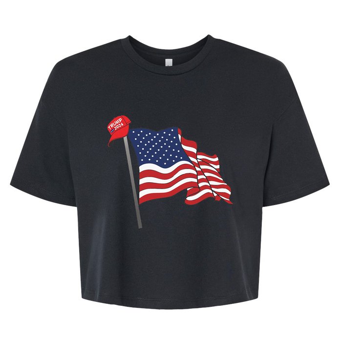 Trump Red Baseball Cap On An American Flag American Pride Bella+Canvas Jersey Crop Tee