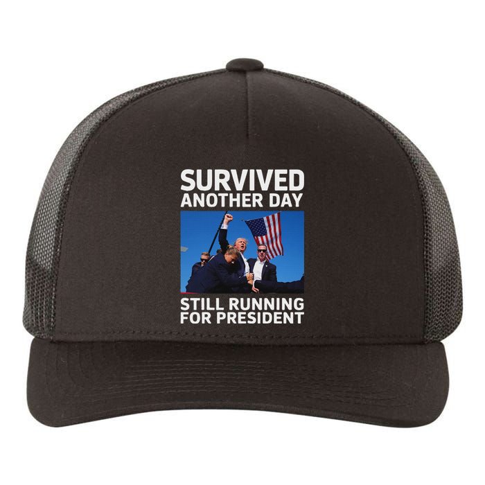 Trump Survived Another Day 2024 Presidential Run Yupoong Adult 5-Panel Trucker Hat