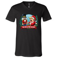 Trump Santa Claus With Nutcracker They Are Eating The Nuts V-Neck T-Shirt