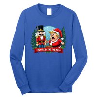 Trump Santa Claus With Nutcracker They Are Eating The Nuts Long Sleeve Shirt