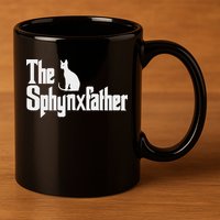 The Sphynxfather Funny Cat Dad Sphynx Lover Gifts 11oz C Handle Ceramic Mug