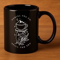 The SurielS Tea Co Spill The Tea 11oz C Handle Ceramic Mug