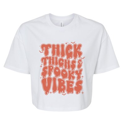 Thick Thighs And Spooky Vibes Great Gift Retro Vintage Halloween Gift Bella+Canvas Jersey Crop Tee