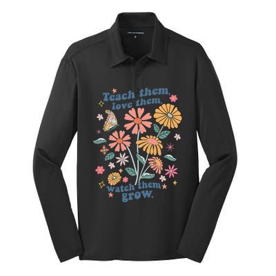 Teach Them Love Them Watch Them Grow Retro Teacher Floral Silk Touch Performance Long Sleeve Polo