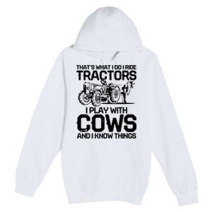 that's what i do i ride tractors i play with cows and i know Premium Pullover Hoodie