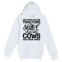 that's what i do i ride tractors i play with cows and i know Premium Pullover Hoodie