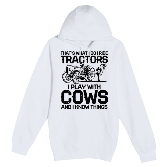 that's what i do i ride tractors i play with cows and i know Premium Pullover Hoodie