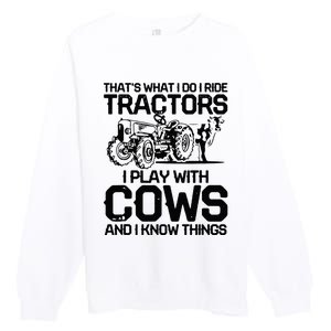 that's what i do i ride tractors i play with cows and i know Premium Crewneck Sweatshirt