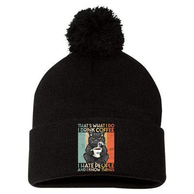 Thats What I Do I Drink Coffee I Hate People And I Know Cat Pom Pom 12in Knit Beanie