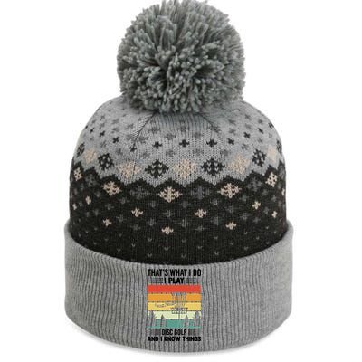 That's What I Do I Play Disc Golf And I Know Things Sport Gift The Baniff Cuffed Pom Beanie