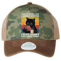 That's What I Do I Drink Coffee I Read Books Retro Black Cat Legacy Tie Dye Trucker Hat