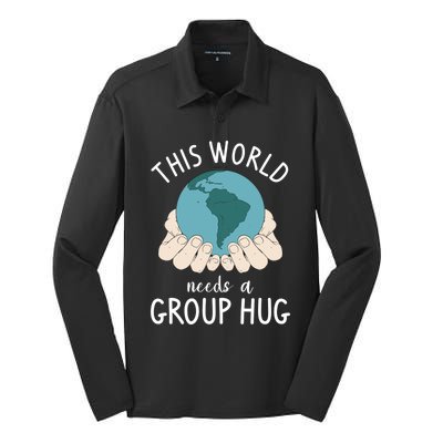 This World Needs A Group Hug International World Peace Day Gift Silk Touch Performance Long Sleeve Polo