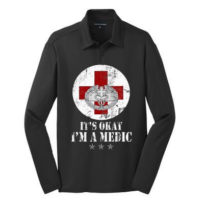 U.S. Army Combat Medic Veteran Its Okay Im A Medic Vintage Silk Touch Performance Long Sleeve Polo