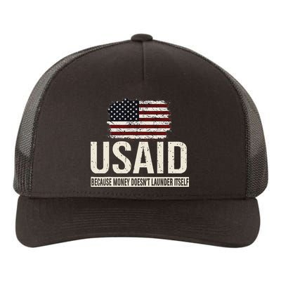 Usaid Because Money Doesn’T Launder Itself Us Americans Yupoong Adult 5-Panel Trucker Hat