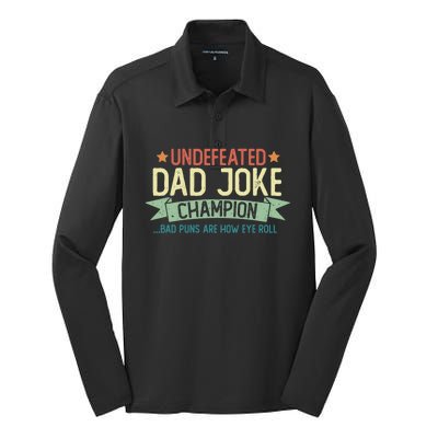 Undefeated Dad Joke Champion Funny Bad Puns Fathers Day Gift Funny Gift Silk Touch Performance Long Sleeve Polo