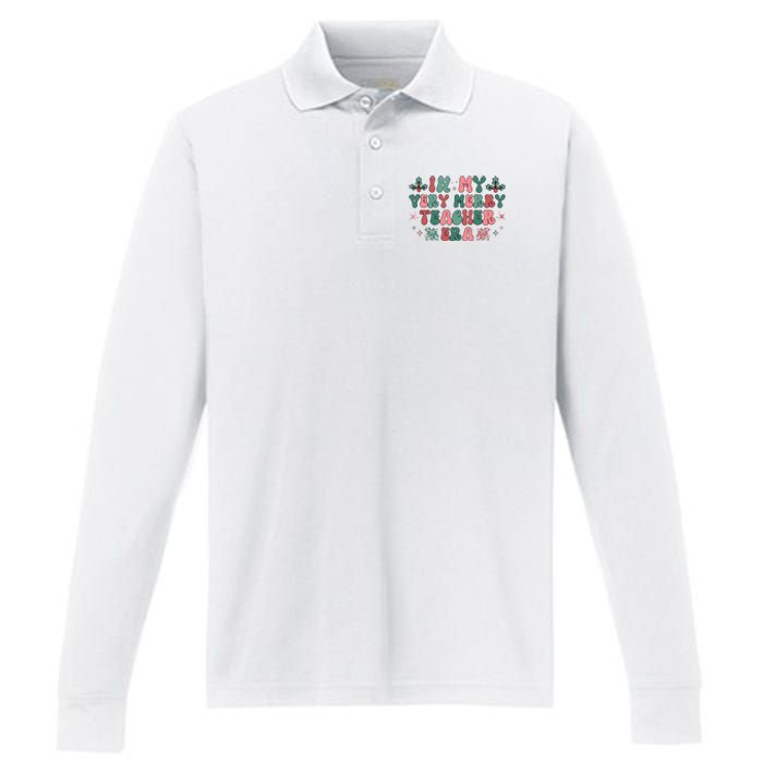 Very Merry Teacher Era Holiday Graphic Performance Long Sleeve Polo