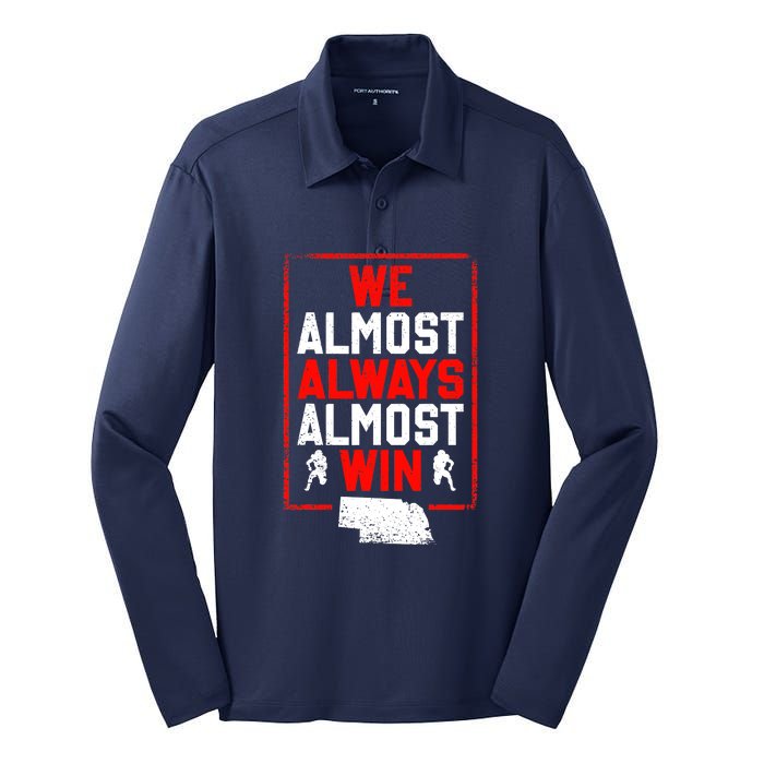 We Almost Always Almost Win Funny Nebraska Football Fans Silk Touch Performance Long Sleeve Polo