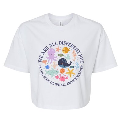 We Are All Different But In This School We All Swim Together Bella+Canvas Jersey Crop Tee