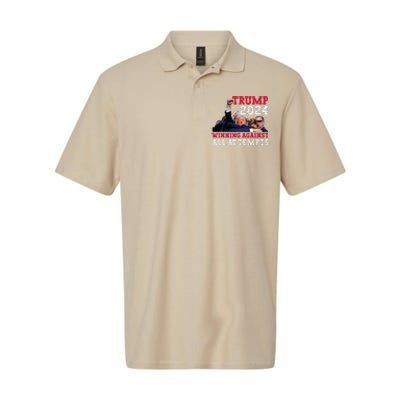 Winning Against All Attempts 47th President Trump Fist Pump Softstyle Adult Sport Polo