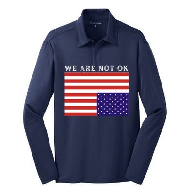 We Are Not Ok Upside Down USA Flag In Distress Silk Touch Performance Long Sleeve Polo