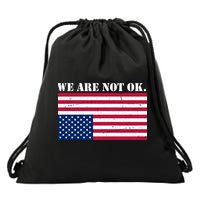 We Are Not Ok Upside Down American Flag Drawstring Bag