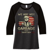 We Are Not Garbage Vote Trump Women's Tri-Blend 3/4-Sleeve Raglan Shirt