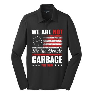 We Are Not Garbage Vote Trump Silk Touch Performance Long Sleeve Polo