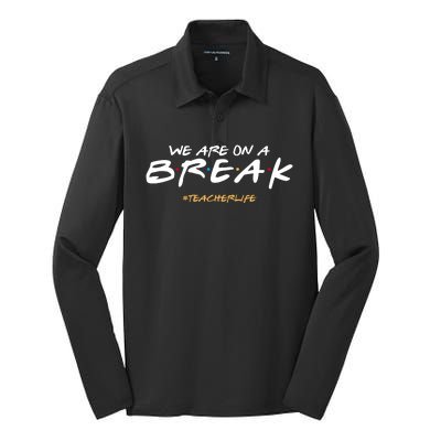 We Are On A Break Teacher Life Silk Touch Performance Long Sleeve Polo