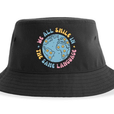 We All Smile In The Same Language Funny Esl Teacher Sustainable Bucket Hat