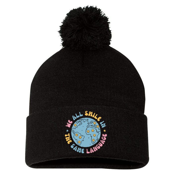 We All Smile In The Same Language Funny Esl Teacher Pom Pom 12in Knit Beanie