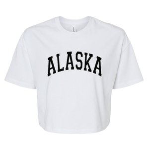 Wo Alaska Varsity Style Pink with Black Text Bella+Canvas Jersey Crop Tee