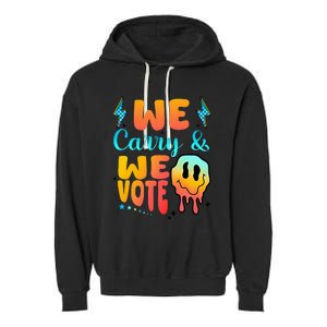 We Carry And We Vote Feminist Kamala 2024 Garment-Dyed Fleece Hoodie