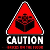 Warning Caution Building Blocks Bricks On Floor Poster