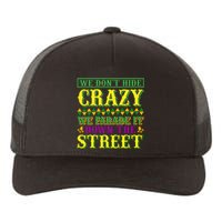 We Don't Hide The Crazy We Parade It Down The Street Yupoong Adult 5-Panel Trucker Hat