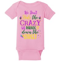 We Dont Hide The Crazy We Parade It Down The Street Funny Mardi Gras Baby Bodysuit