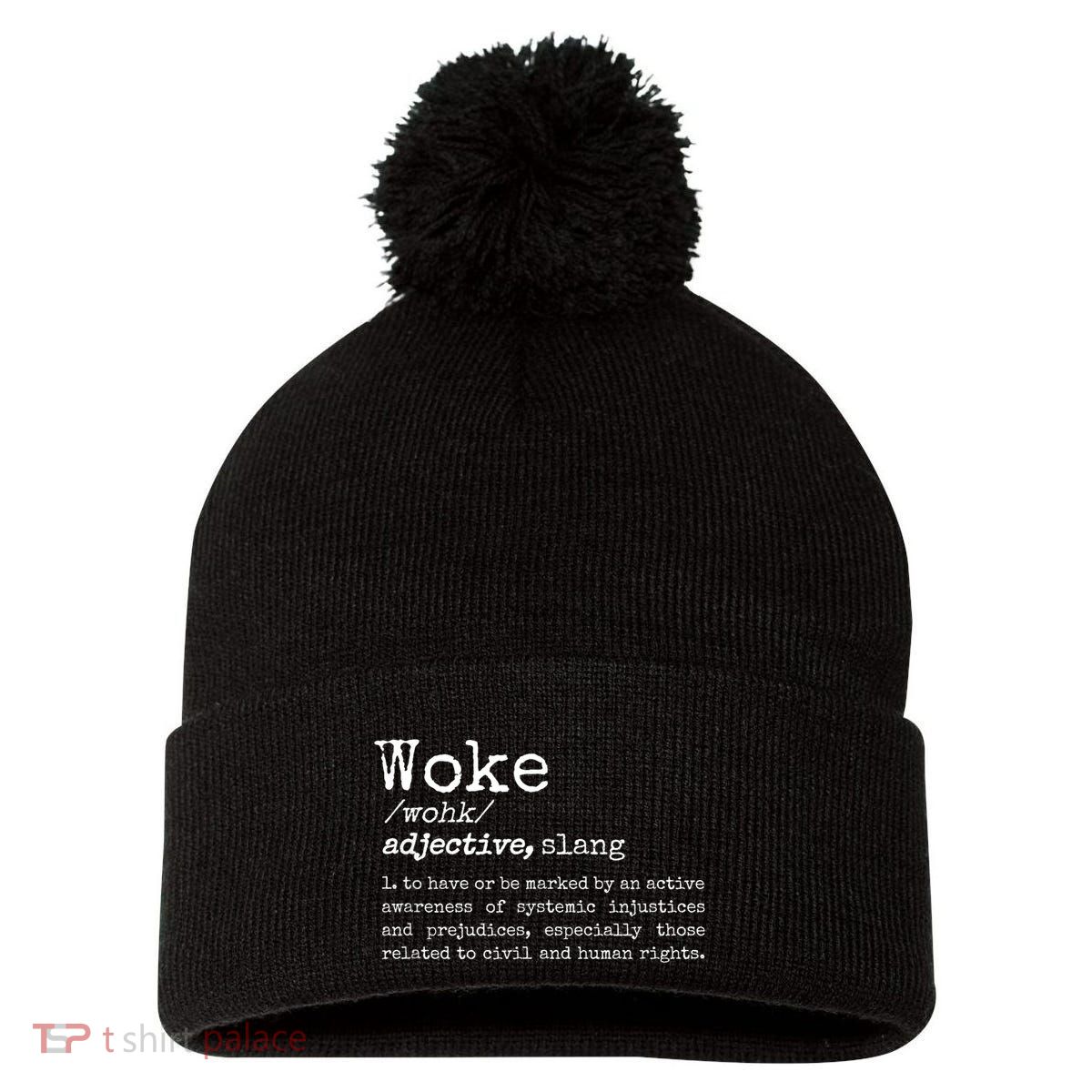 Woke Definition To Have An Awareness Of Systemic Injustices Pom Pom 12in Knit Beanie