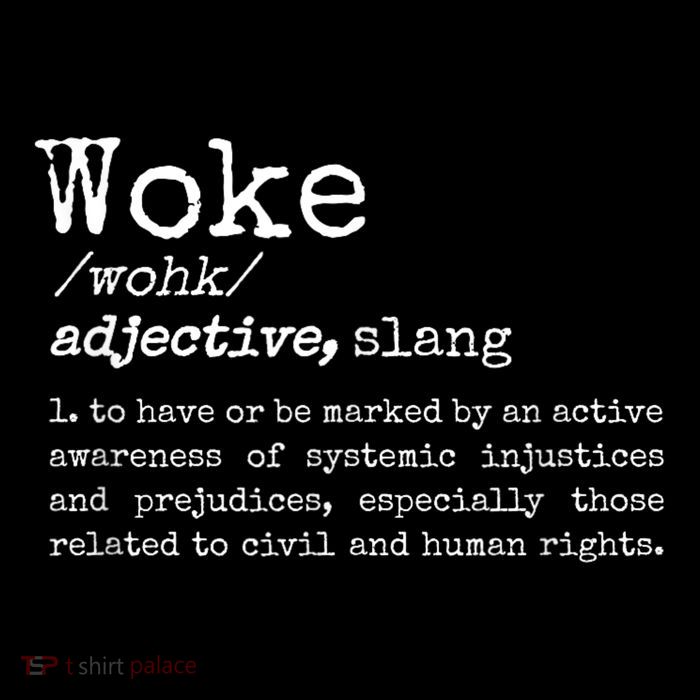 Woke Definition To Have An Awareness Of Systemic Injustices Pom Pom 12in Knit Beanie