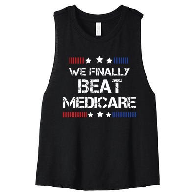 We Finally Beat Medicare Women's Racerback Cropped Tank