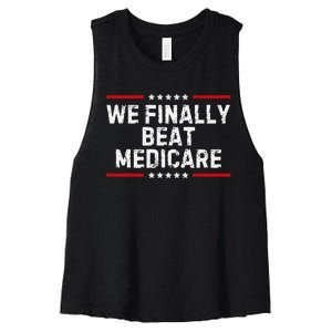 We Finally Beat Medicare Humorous Women's Racerback Cropped Tank