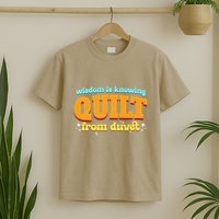 Wisdom Is Knowing A Quilt From A Duvet. T-Shirt